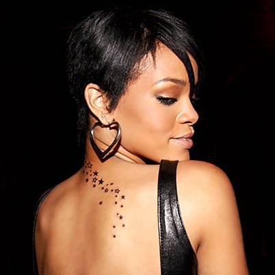 neck tattoo. Rihanna neck tattoo - 1